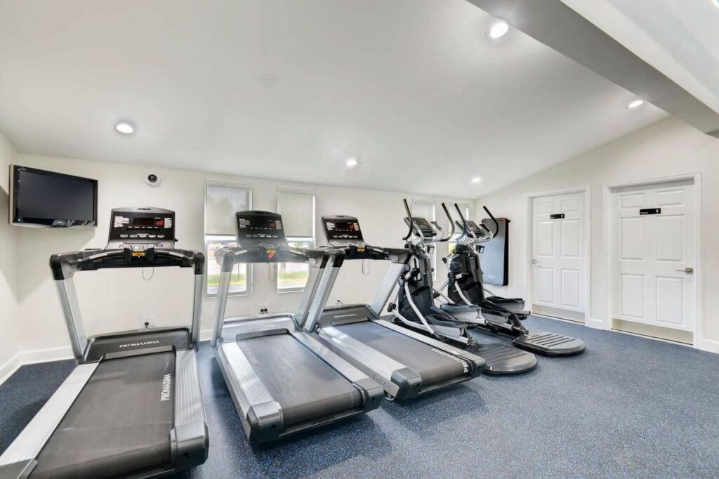 fitness center with cardio machines