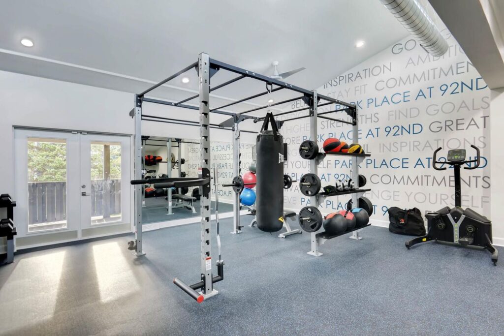 Fitness center with functional training equipment at Park Place at 92nd luxury apartments in Westminster