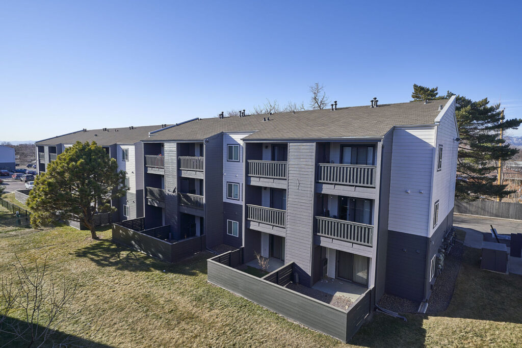 Building exterior showing private patios and balconies